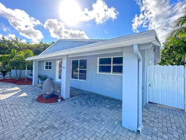 Продажа дома по адресу 2749 NW 9th Ave - фото 6254820