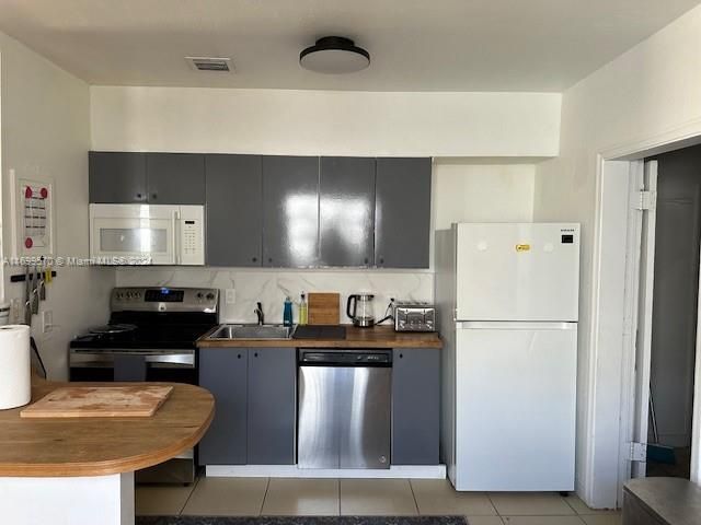 Продажа дома по адресу 810 NW 43rd St - фото 5969401