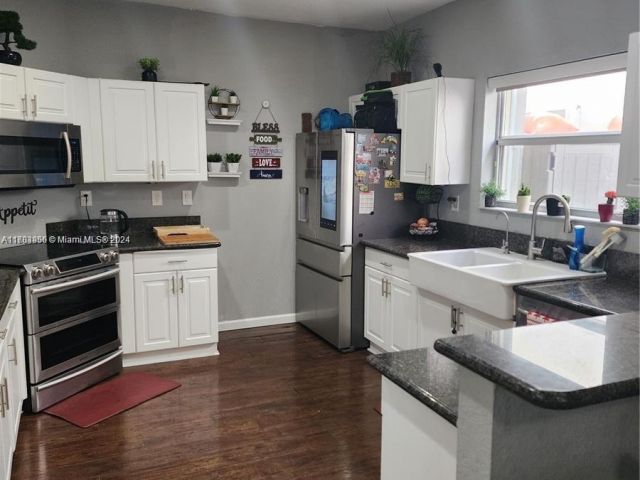 Продажа дома по адресу 229 NE 36th Ter - фото 6009577