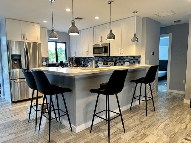 Продажа дома по адресу 513 NW 30th St - фото 5601267