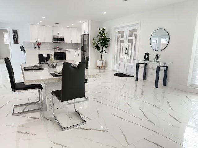 Продажа дома по адресу 1485 NE 57th Ct - фото 6118139