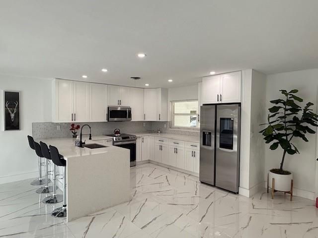 Продажа дома по адресу 1485 NE 57th Ct - фото 6118145