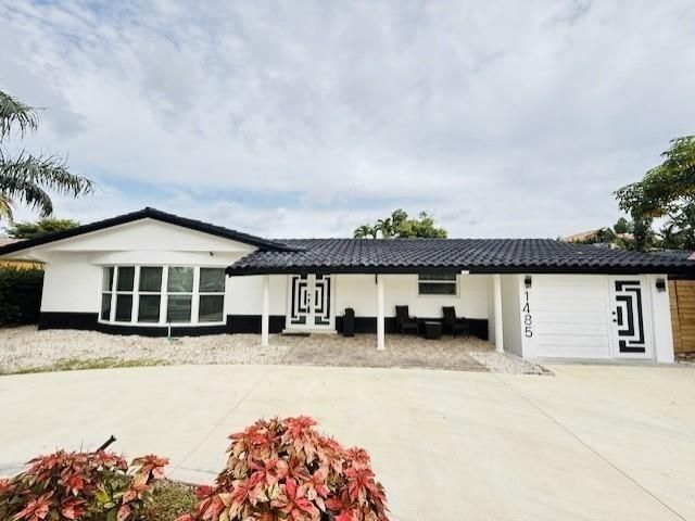 Продажа дома по адресу 1485 NE 57th Ct - фото 6118151