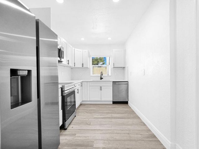 Продажа дома по адресу 419 NW 19th Ave - фото 6280550