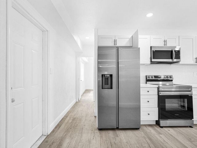 Продажа дома по адресу 419 NW 19th Ave - фото 6280551