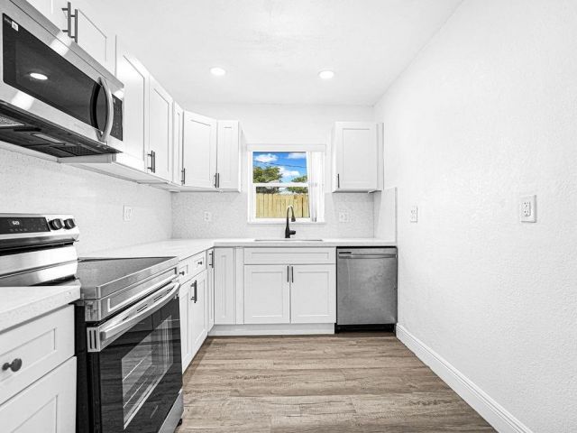 Продажа дома по адресу 419 NW 19th Ave - фото 6280555