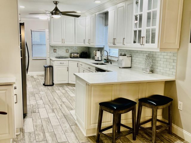 Дом в аренду по адресу 115 NE 18th Street - фото 5756947