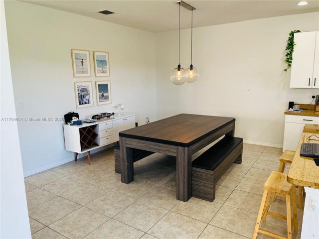 Продажа дома по адресу 616 NE 193rd St - фото 5703403