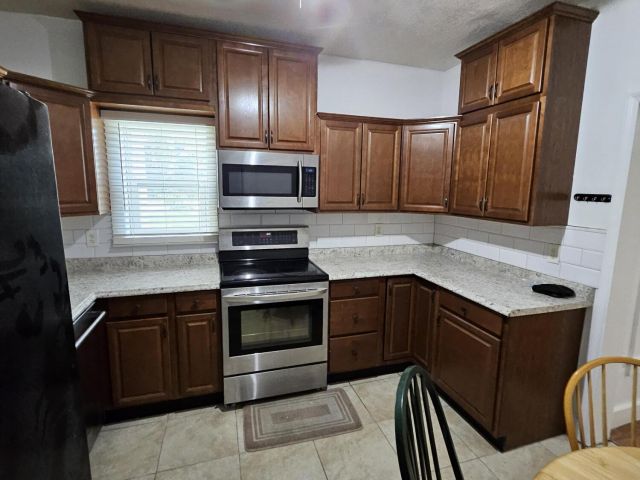 Продажа дома по адресу 701 SW 8th Avenue - фото 6656903