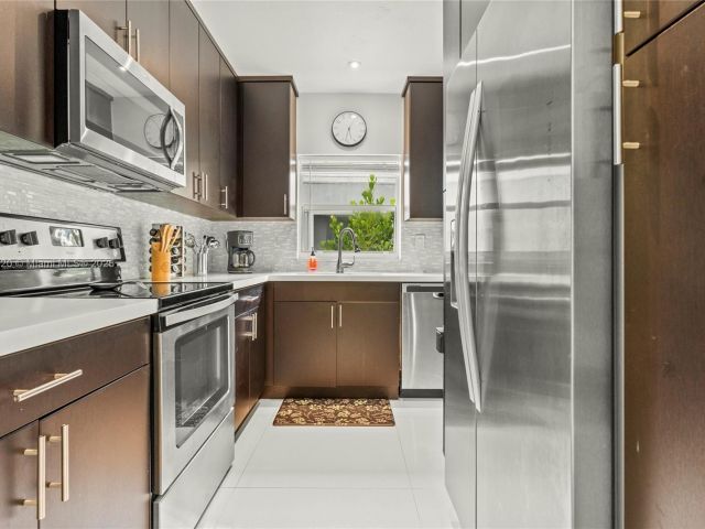 Дом в аренду по адресу 775 NW 44th St - фото 6047164