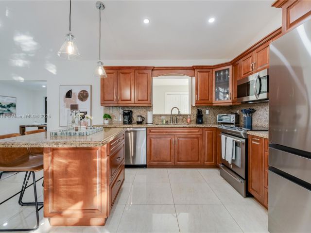 Дом в аренду по адресу 14517 SW 98th Ter - фото 5930444