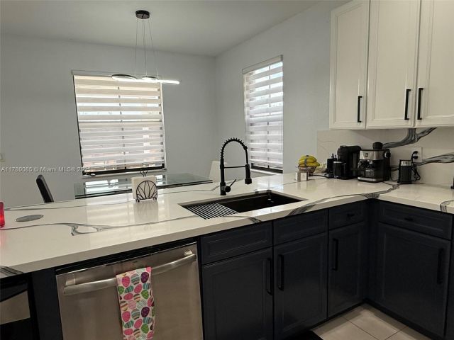 Продажа дома по адресу 10060 NW 86th Ter - фото 6122307