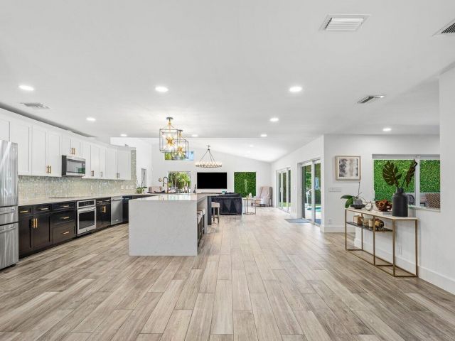 Продажа дома по адресу 7700 NE Spanish Trail Court - фото 6017510