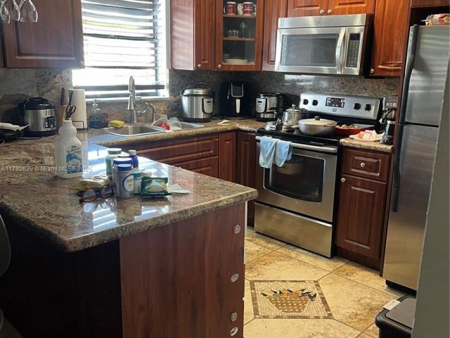 Продажа дома по адресу 6725 SW 137th Ct 14D - фото 5955188