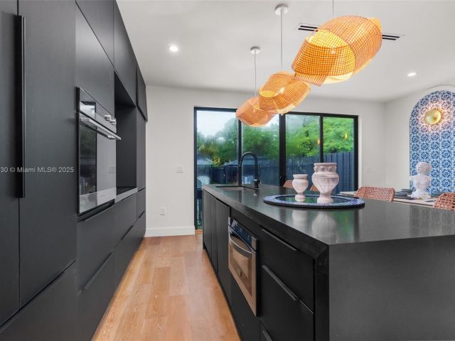 Дом в аренду по адресу 408 NW 52nd St 408 - фото 6031482