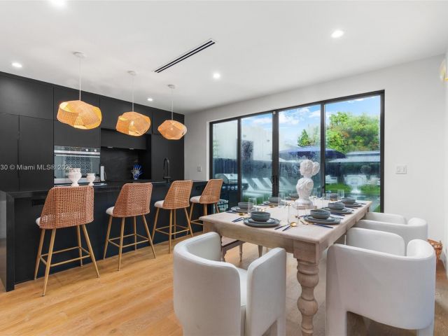 Дом в аренду по адресу 408 NW 52nd St 408 - фото 6031483