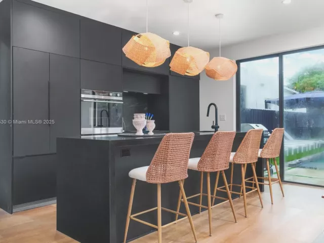 Дом в аренду по адресу 408 NW 52nd St 408 - фото 6031486