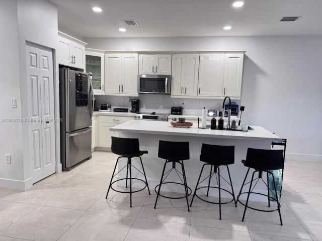 Продажа дома по адресу 10409 NW 61st Ln - фото 6048574