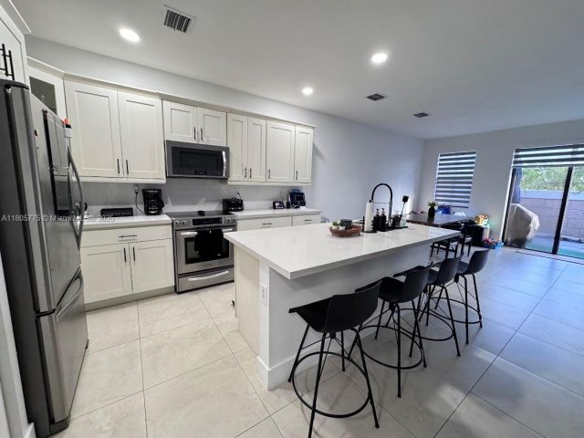 Продажа дома по адресу 10409 NW 61st Ln - фото 6048575