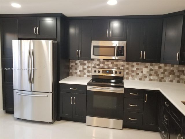 Дом в аренду по адресу 907 NE 27th Ave 907 - фото 6044167