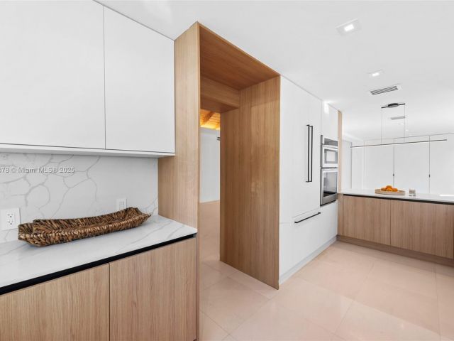 Дом в аренду по адресу 120 NE 49th St - фото 6083531