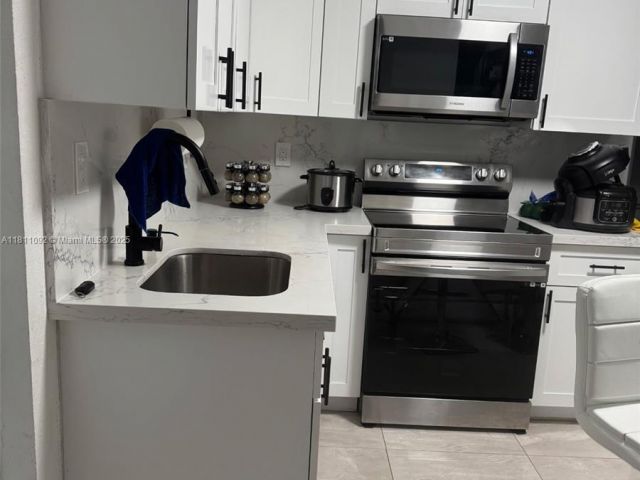 Продажа дома по адресу 5010 NW 190th St - фото 6129390