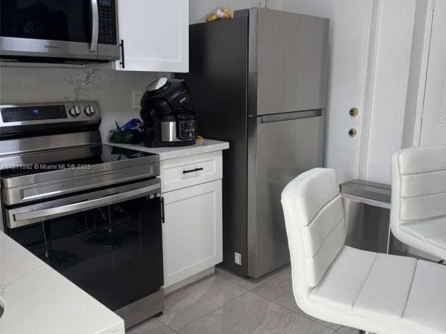 Продажа дома по адресу 5010 NW 190th St - фото 6129391