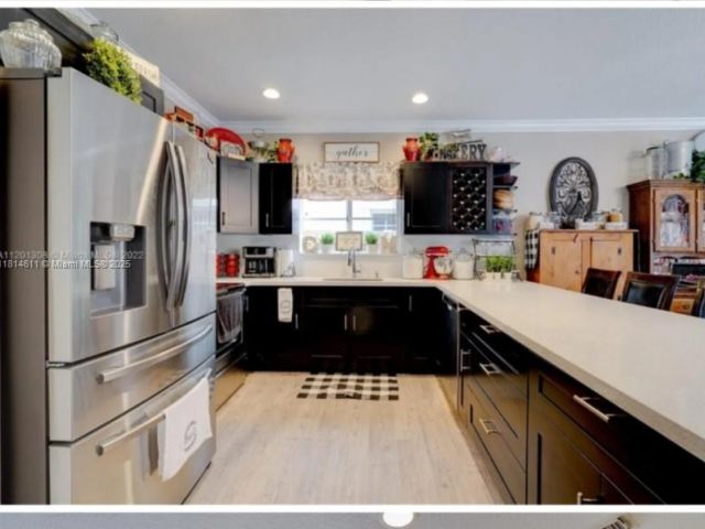 Продажа дома по адресу 2967 NE 42nd Ave - фото 6152426