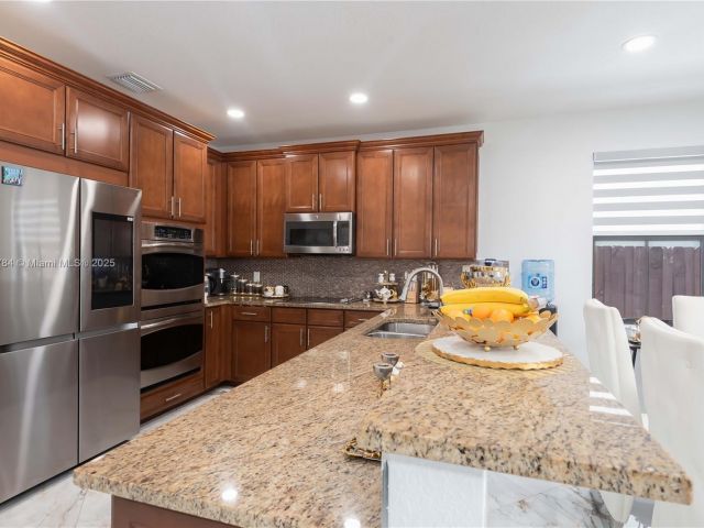 Продажа дома по адресу 8885 NW 100th Pl - фото 6159833