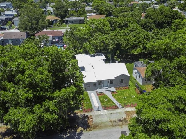 Продажа дома по адресу 1051 NW 63rd St - фото 6184842