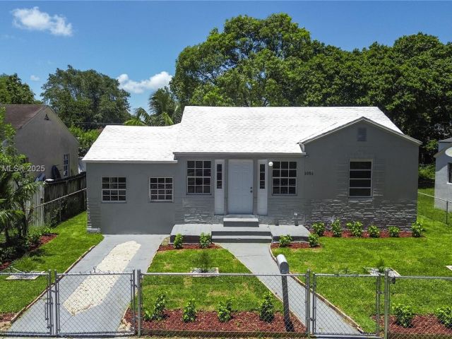 Продажа дома по адресу 1051 NW 63rd St - фото 6184844