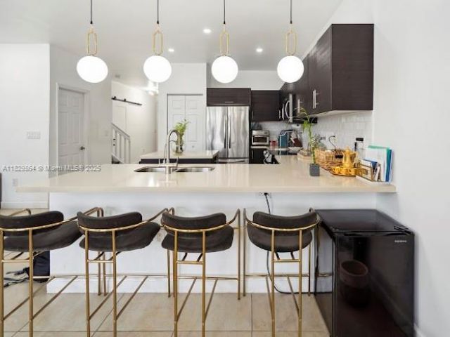 Дом в аренду по адресу 7042 NW 103rd Path - фото 6211234