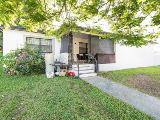 Продажа дома по адресу 7190 NW 21st Ave - фото 6284941