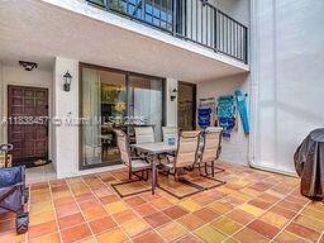 Дом в аренду по адресу 350 Grapetree Dr 405 - фото 6275492