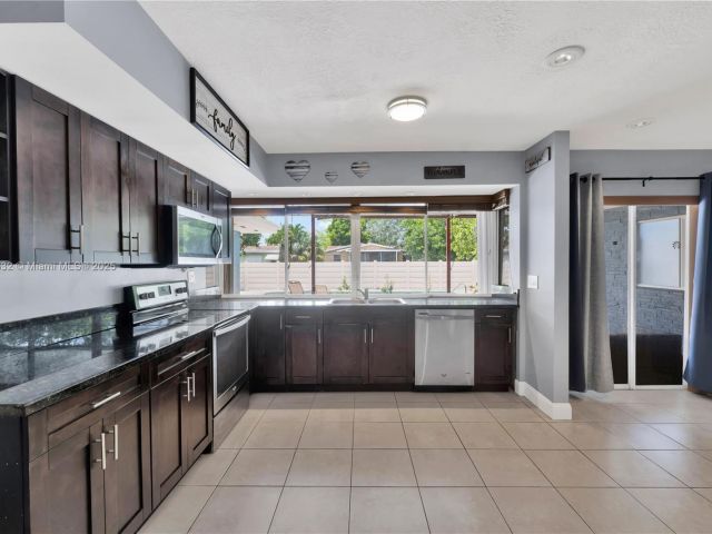 Продажа дома по адресу 1730 N 55th Ave - фото 6275106