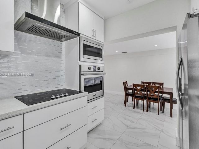 Продажа дома по адресу 6470 SW 27th St - фото 7441366