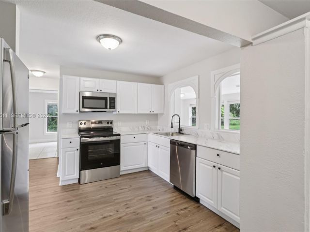 Продажа дома по адресу 11382 N 59th St N - фото 7487276