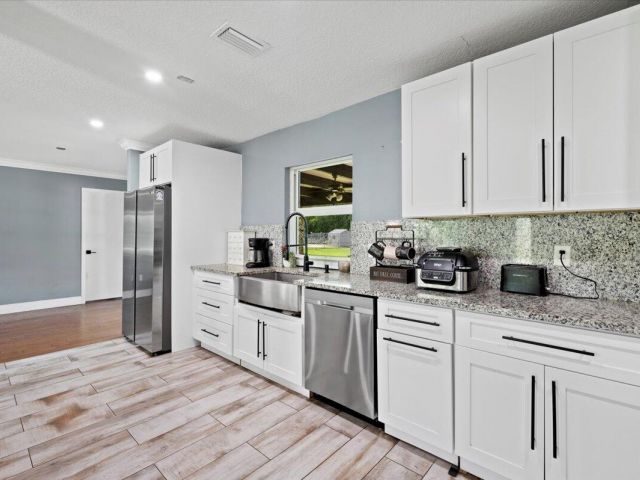 Дом в аренду по адресу 11128 42nd Road N - фото 6507178