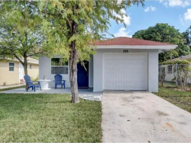 Дом в аренду по адресу 325 SW 4th Avenue - фото 6594971