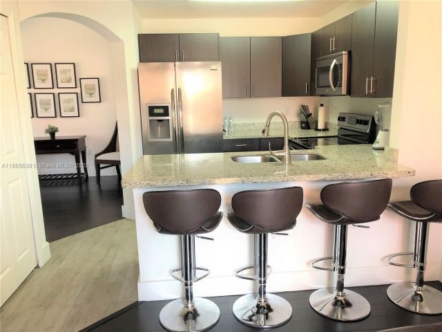 Дом в аренду по адресу 6202 NW 116th Ave 449 - фото 7437614