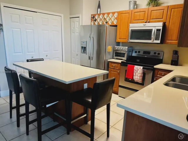 Дом в аренду по адресу 11500 NW 60th Ter 375 - фото 6602114