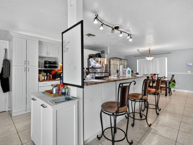 Продажа дома по адресу 1413 Westchester Drive N - фото 6628440