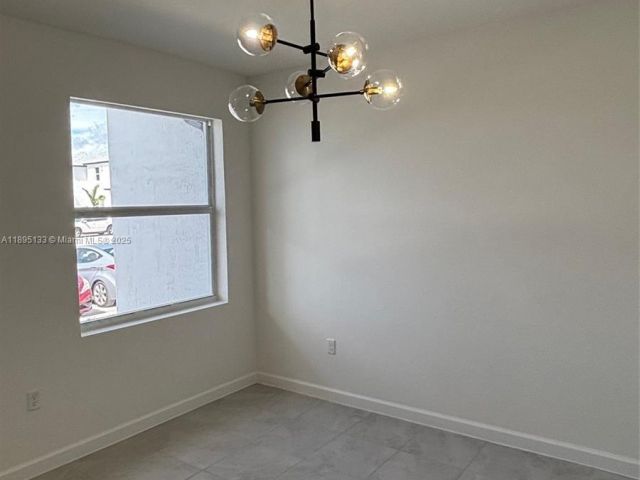 Дом в аренду по адресу 27709 SW 155 CT - фото 7516793