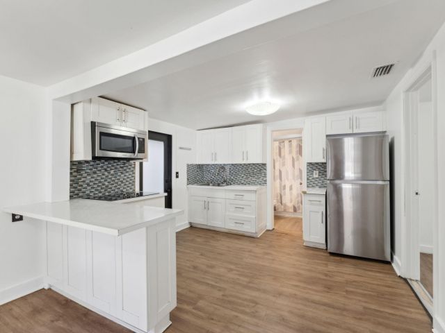 Дом в аренду по адресу 1204 NW 70th Street - фото 6669985