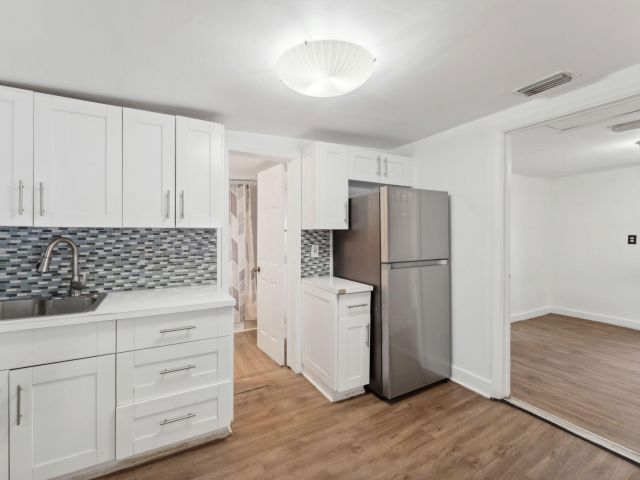 Дом в аренду по адресу 1204 NW 70th Street - фото 6669988