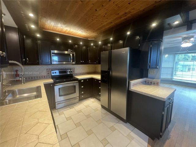 Дом в аренду по адресу 141 NW 72nd Way 1 - фото 7430751