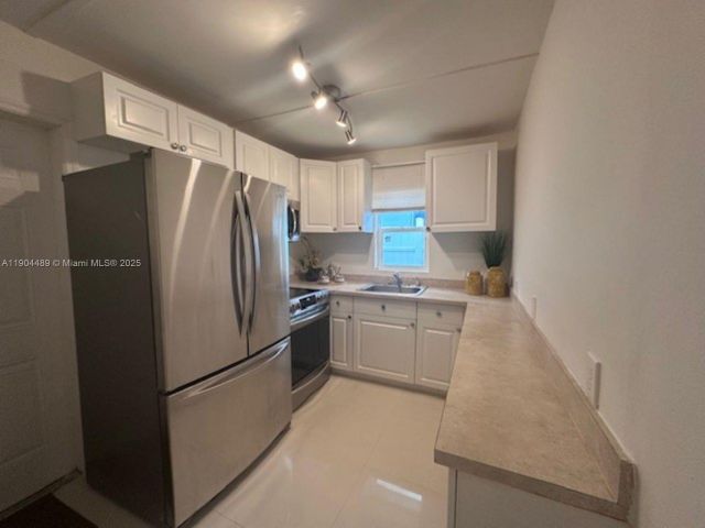 Дом в аренду по адресу 2898 NW 6th Ct - фото 7471955