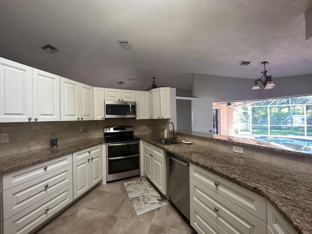 Продажа дома по адресу 450 NW 53rd Street - фото 6748822