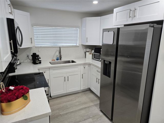 Дом в аренду по адресу 1420 NW 116th St - фото 7427655