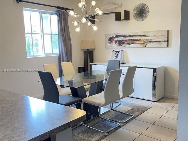 Дом в аренду по адресу 27563 SW 139th Psge #A - фото 7483508